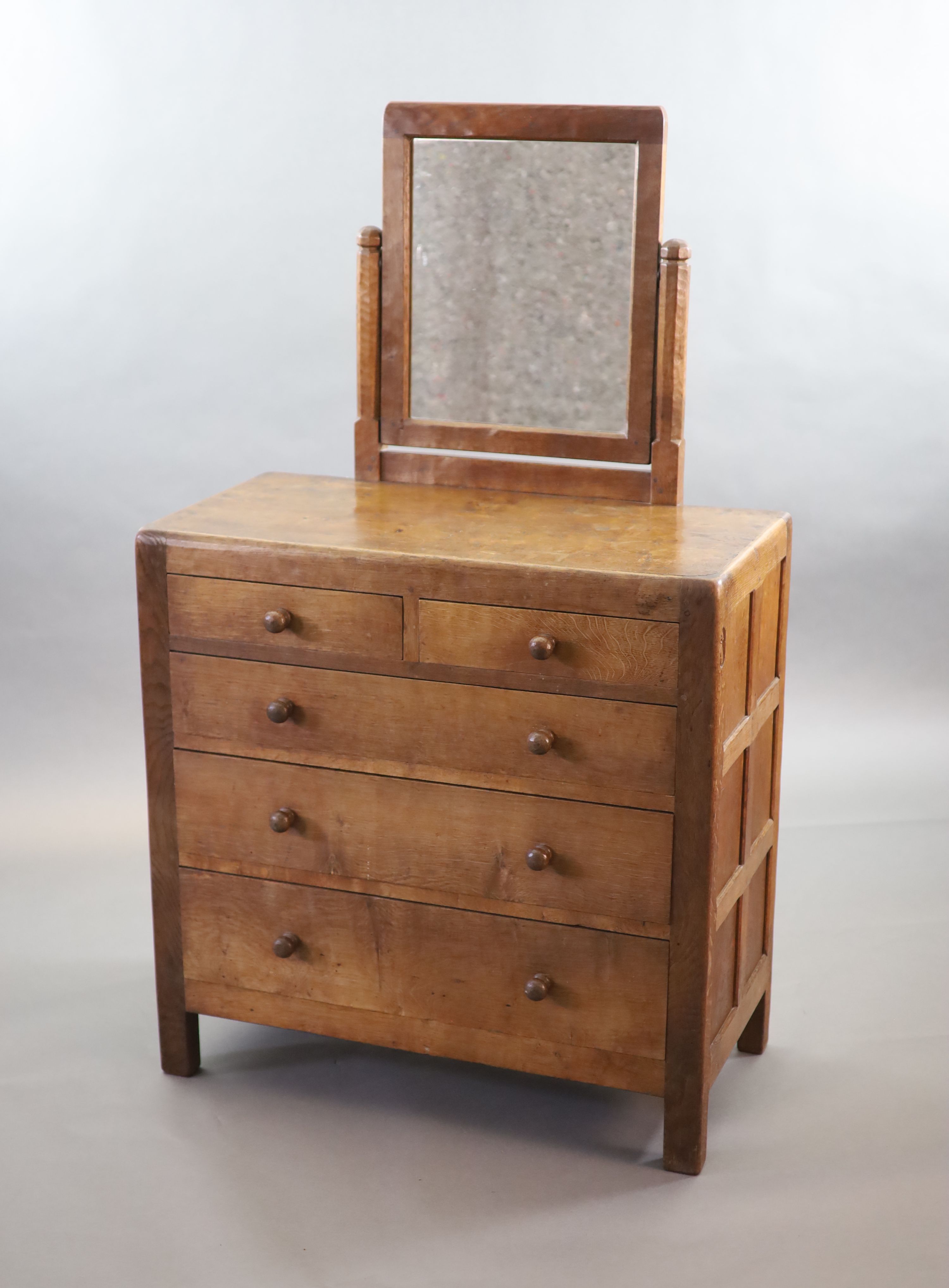A Robert Thompson Mouseman oak dressing chest, W.91cm D.46cm H.152cm